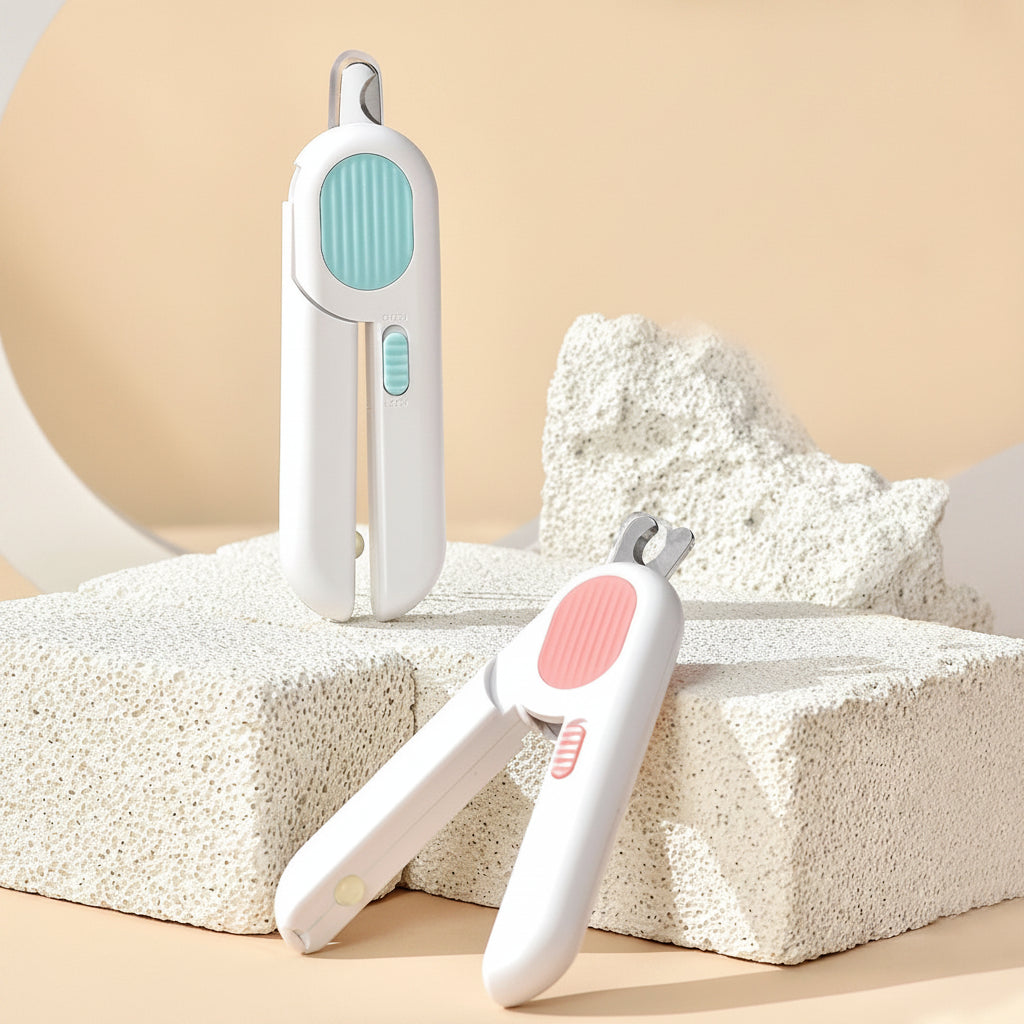 Two gravitational LED labor-saving shears on a textured surface with a beige background.